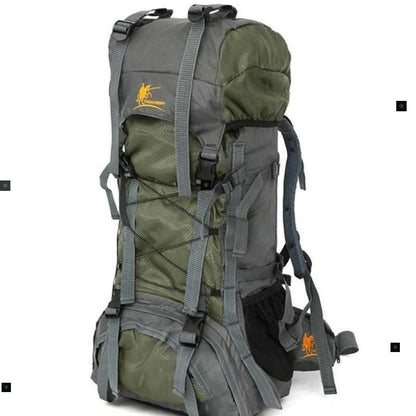 Green and gray backpack with visible brand logo on a white background