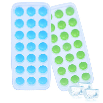 Two silicone ice cube trays with blue and green round molds on a white background.