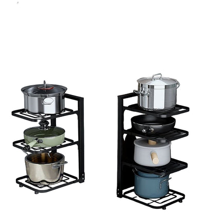 Kitchen storage rack with pots and pans inside a cabinet, countertop, and corner.