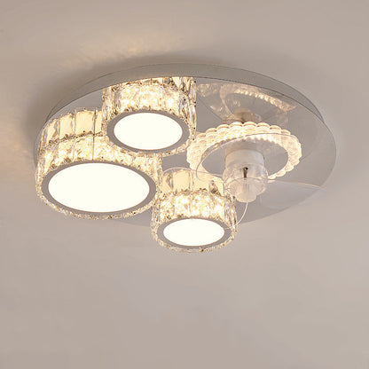 Ceiling light fixture with crystal accents on a plain background