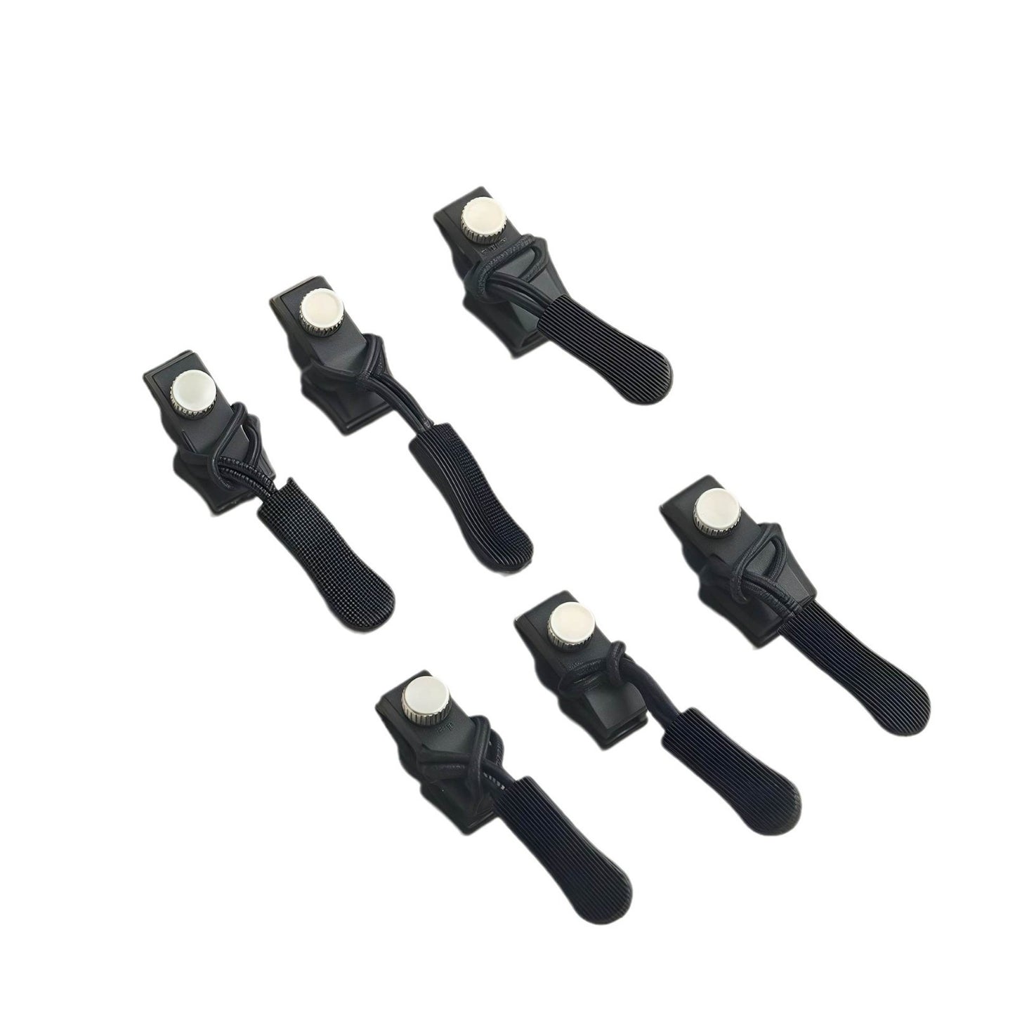 Set of six black hair clip retainers on a white background