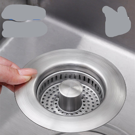 Stainless steel sink strainer being held over a sink with features highlighted.